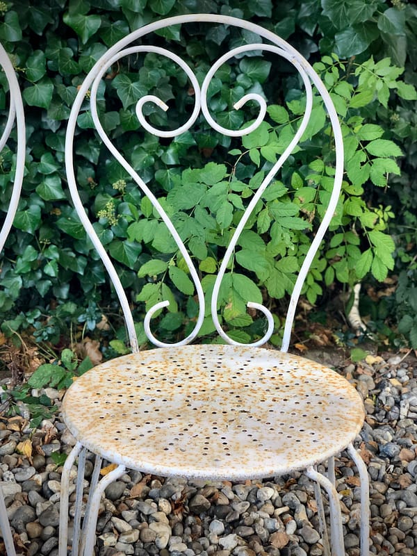 Grey/lilac garden furniture with heart-shaped detail